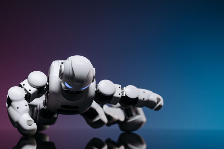 A close-up of a futuristic white robot performing a push-up on a glossy surface against a gradient backdrop.